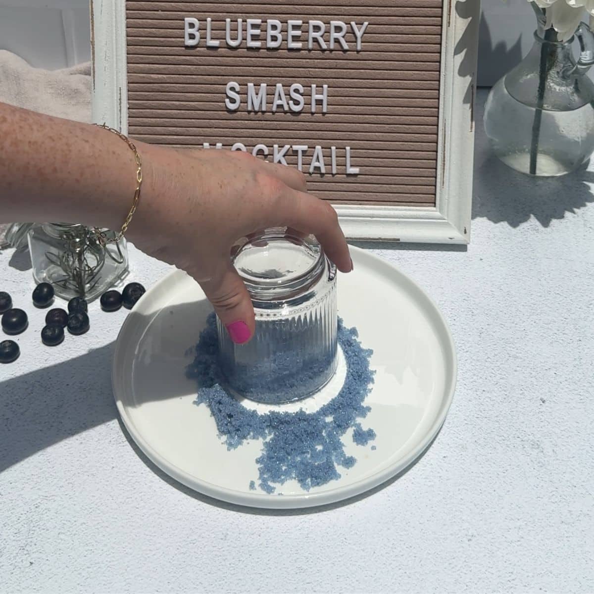 rosemary blueberry smash mocktail